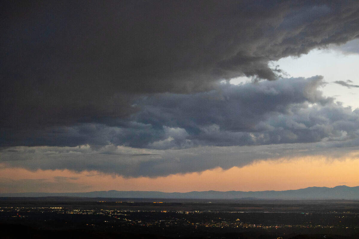 A storm over the Boise area is viewed from Bogus Basin Road in 2023. The Owyhee mountain range is in the distance to the south of Boise.