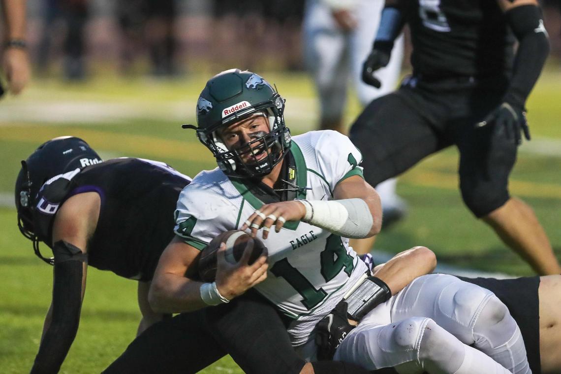 Eagle quarterback Ben Ford found little running room against Rocky Mountain’s stout defense.