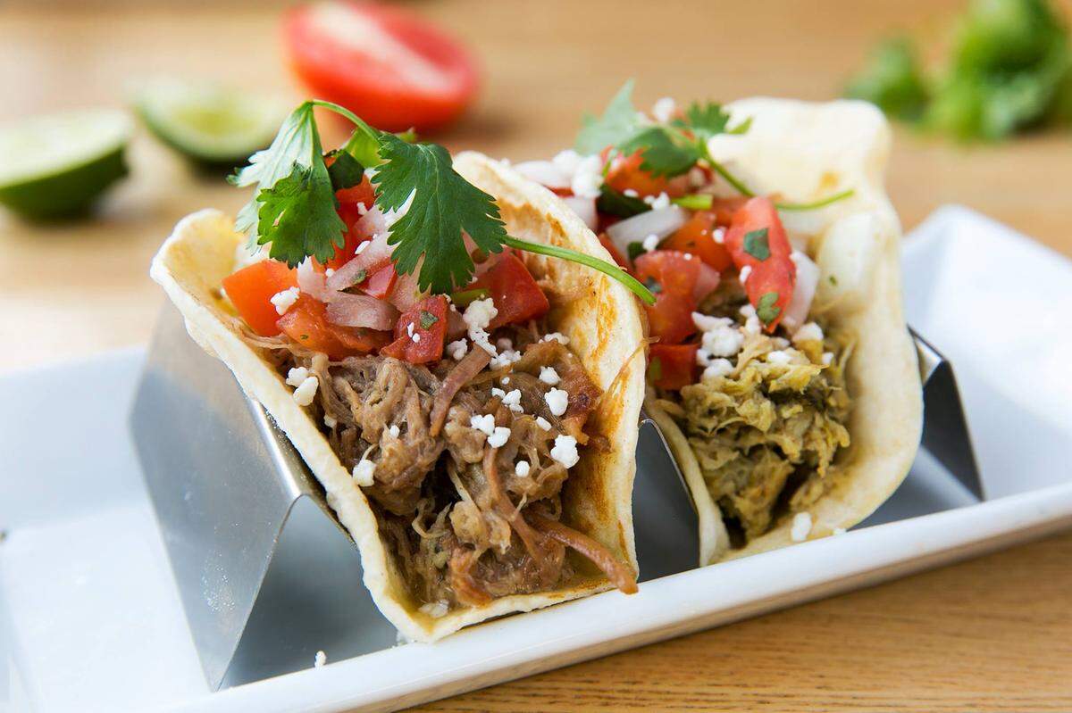Order a Gringo Taco ($2.50) in your choice of handmade flour or corn tortilla, and it will come with green-chili-braised Red Bird chicken or slow braised pork, pico and queso fresco.