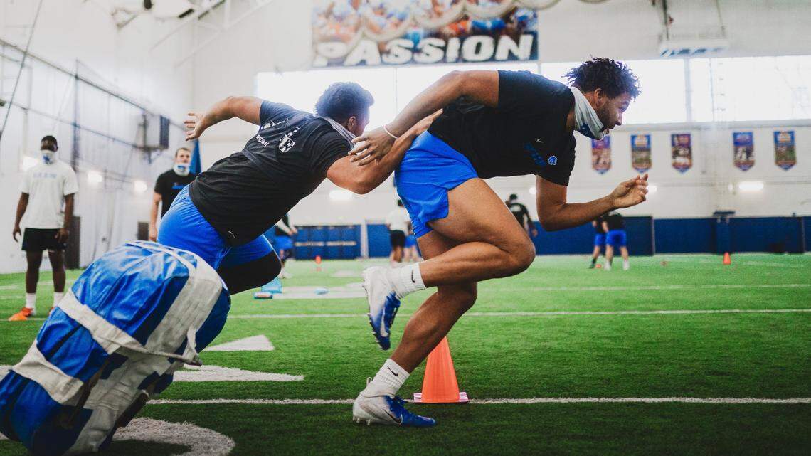 Boise State STUD Isaiah Bagnah runs a drill during spring practice. Bagnah saw his snaps increase last season and he racked up three sacks in the final two games of the year.