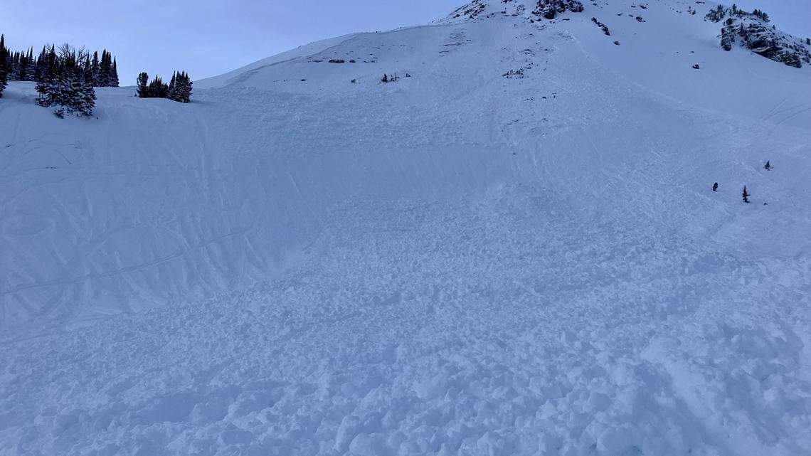 A 21-year-old snowmobiler from Washington died in an avalanche in Montana on New Year’s Eve while his younger brother rode on the next slope, rescuers said.