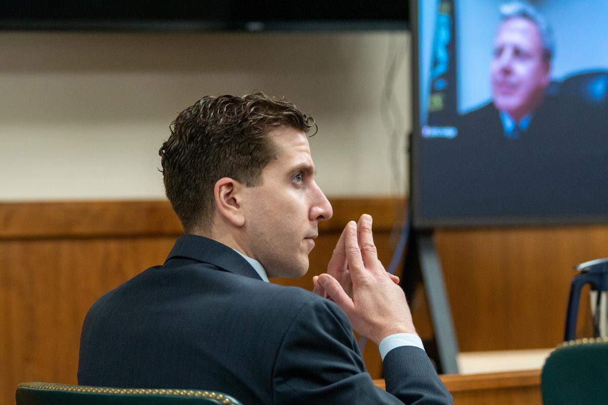 Bryan Kohberger, who is charged with first-degree murder in the stabbing deaths of four University of Idaho students in November 2022, listens to arguments during a hearing in October 2023.