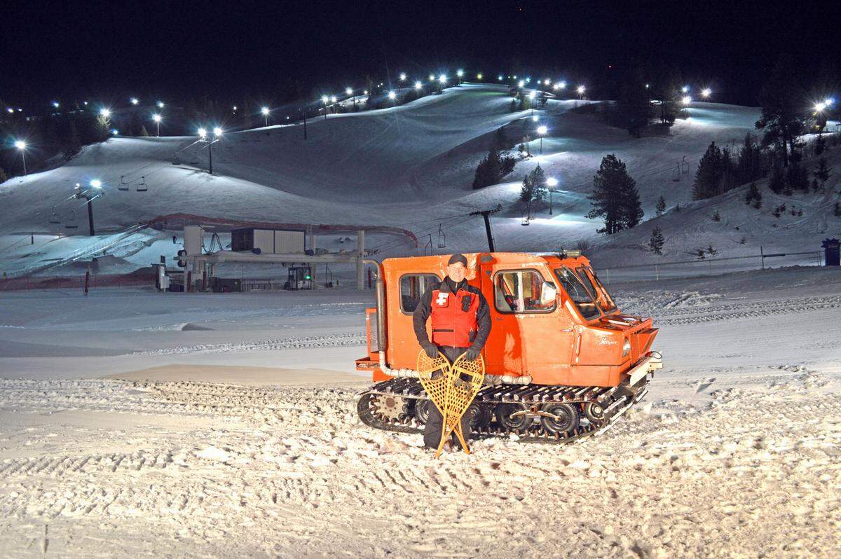 Richard Jayo poses with a 1975 Snowcat Imp at Bogus Basin Mountain Recreation Area.