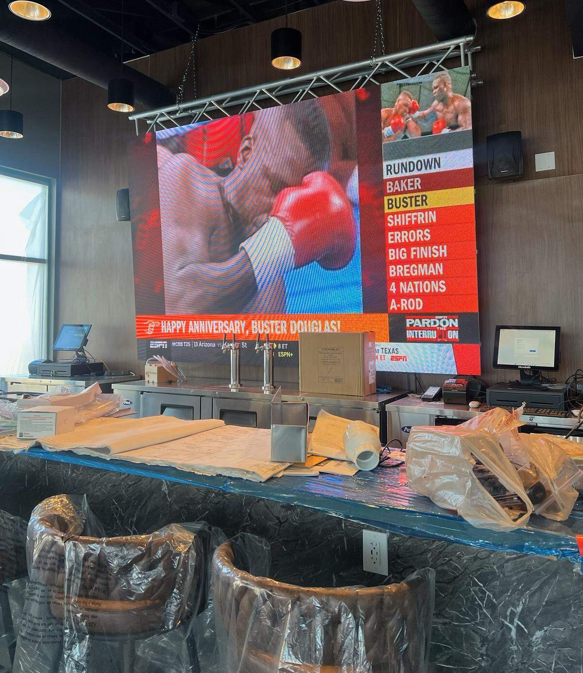 The new sports hangout will feature a large, bright LED video wall behind the bar.