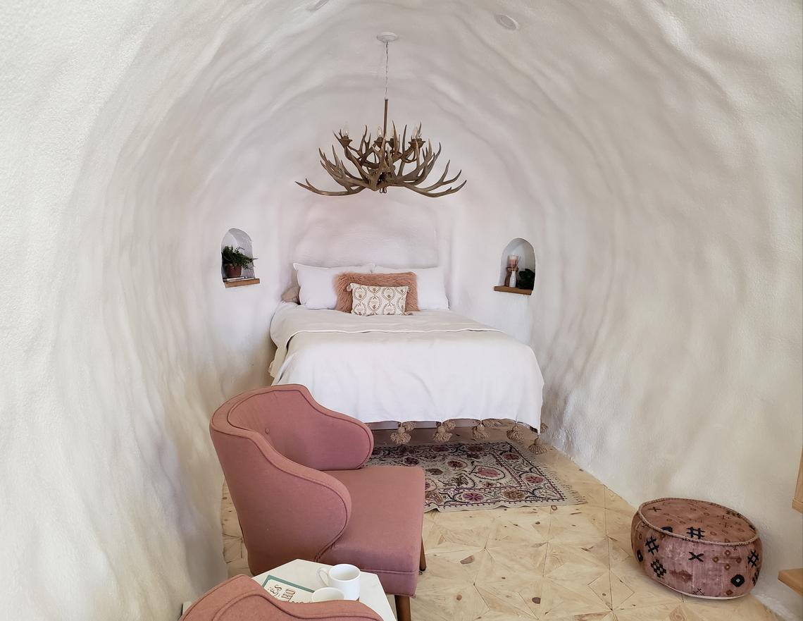 The Big Idaho Potato Hotel includes a queen-size bed, two easy chairs, ottoman and a chandelier made from elk horns.