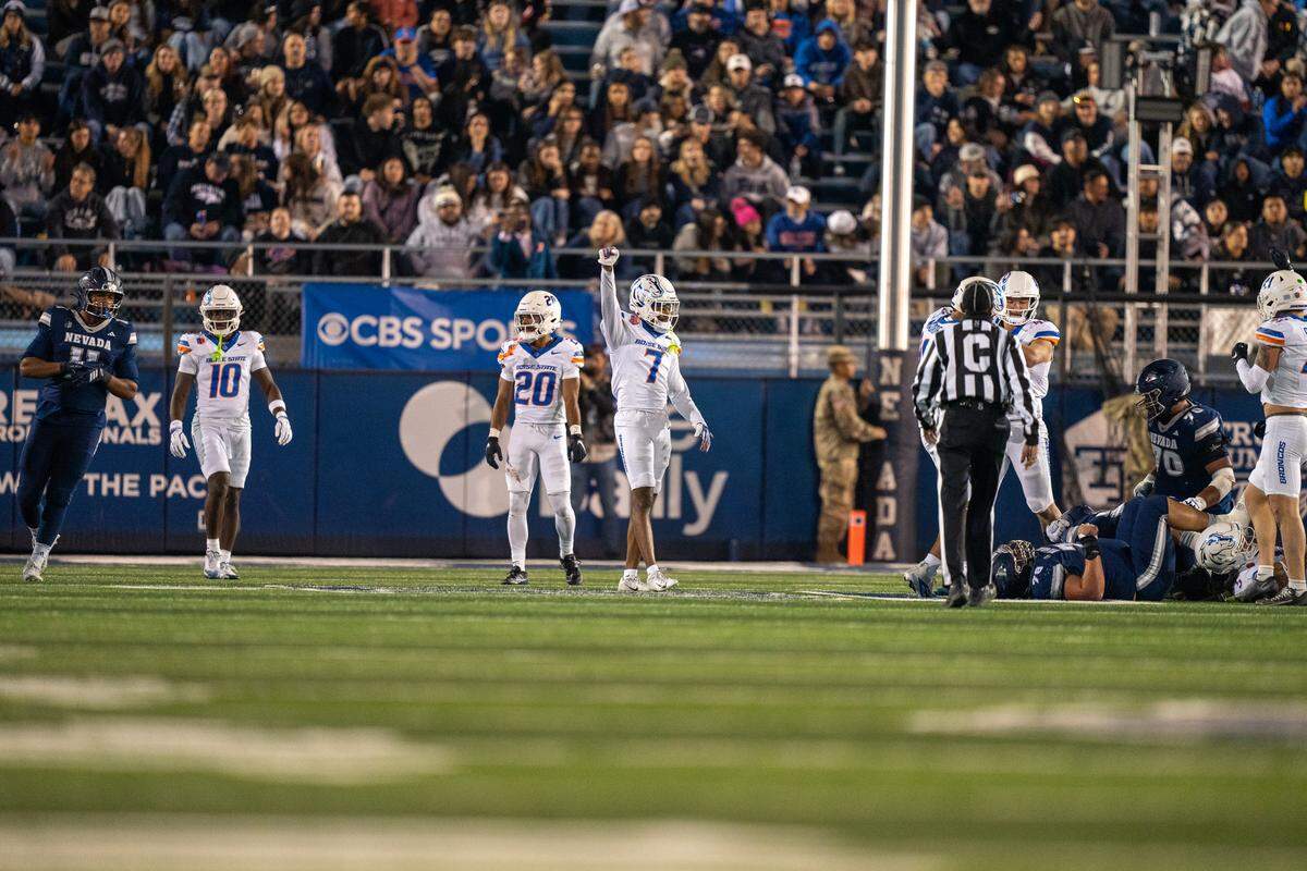 Boise State fifth-year cornerback A’Marion McCoy celebrates a stop during Boise State’s game against Nevada on Friday night at Mackay Stadium. McCoy had an interception in the first half, one of three the team had in the game.