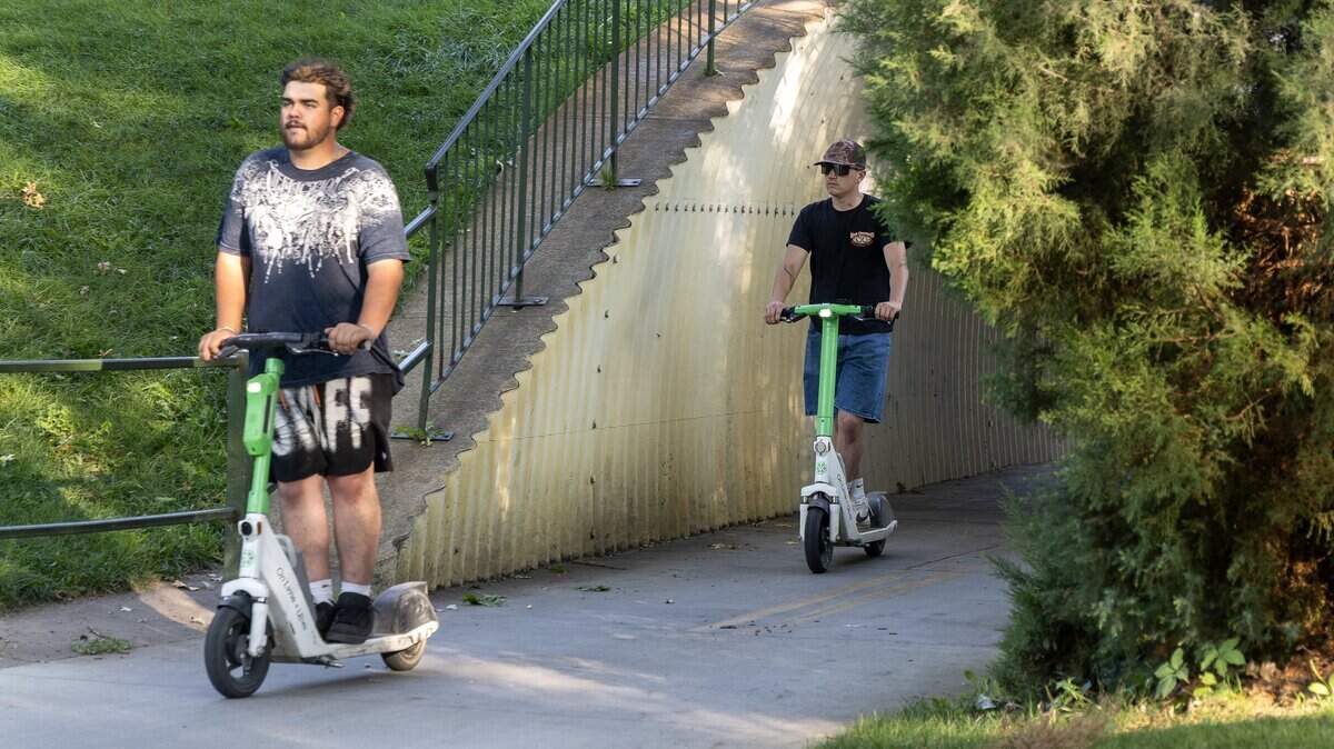 People ride Lime e-scooters on the Greenbelt in Boise, Saturday, August. 23, 2025.