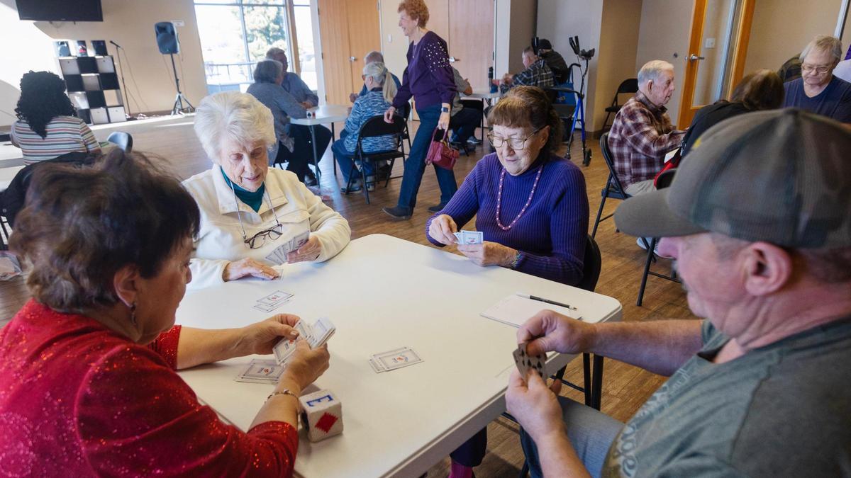 Darylene Armstrong, left, Jan Wood, Ethel Heaney and Dave Paine play pinochle at the Meridian Senior Center. Meridian city leaders say they are taking into consideration its growing senior population when planning parks and other amenities.