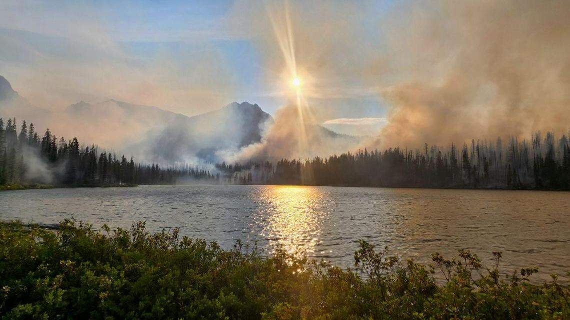 The Bench Lake Fire has burned nearly 1,300 acres about 8 miles south of Stanley, and has reached the western shore of Redfish Lake.