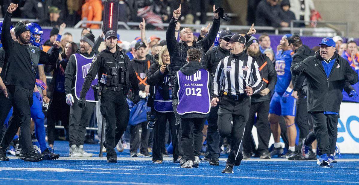 Boise State head coach Spencer Danielson celebrates at the end of Friday night’s win over UNLV in the Mountain West championship game.