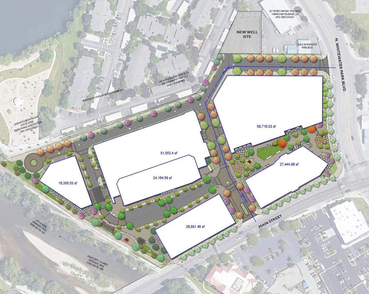 This proposed site plan shows the academic building at bottom right, with the rest of the commercial and residential spread among the other buildings.