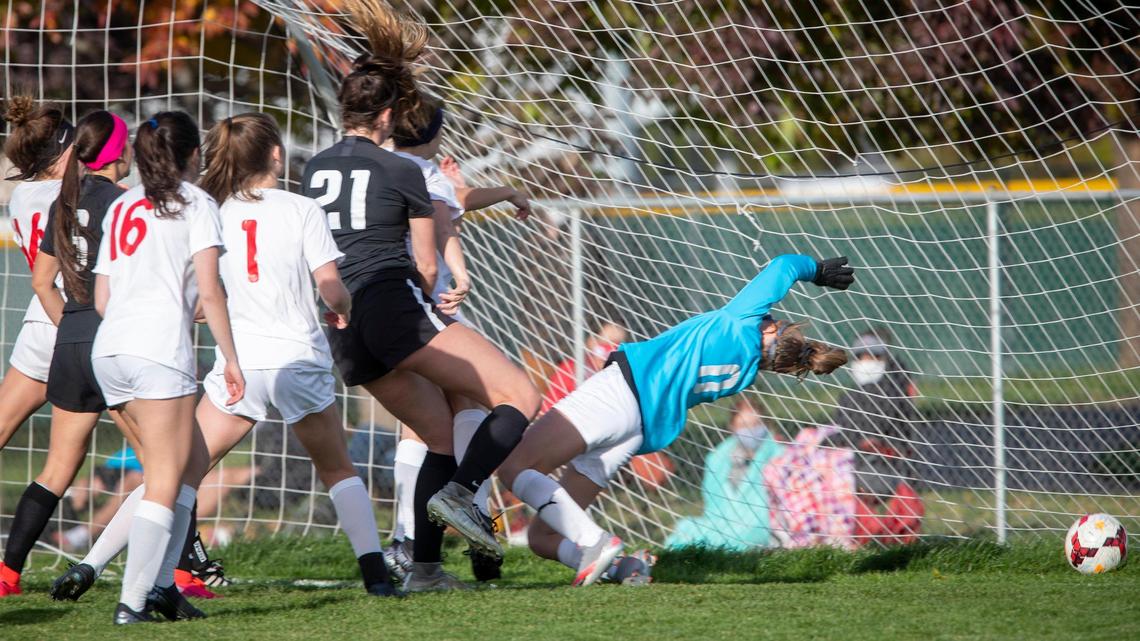 Rocky Mountain’s Jada Torpey heads in a shot past Boise goalie Sophie Hills for the opening goal Wednesday.