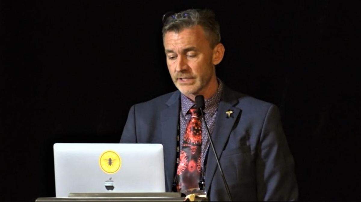 Dr. Ryan Cole speaks at a conference in this file photo in early October. He presented more falsehoods at the Idaho Capitol on Thursday in an event organized by the Idaho Freedom Foundation.