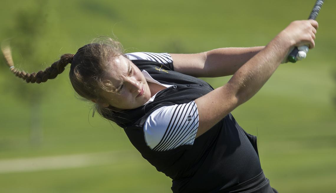 Bishop Kelly's Lizzy Godinho won her second 4A District Three individual title in three seasons on Monday. The senior shot a 9-over 80 at RedHawk Golf Course in Nampa.