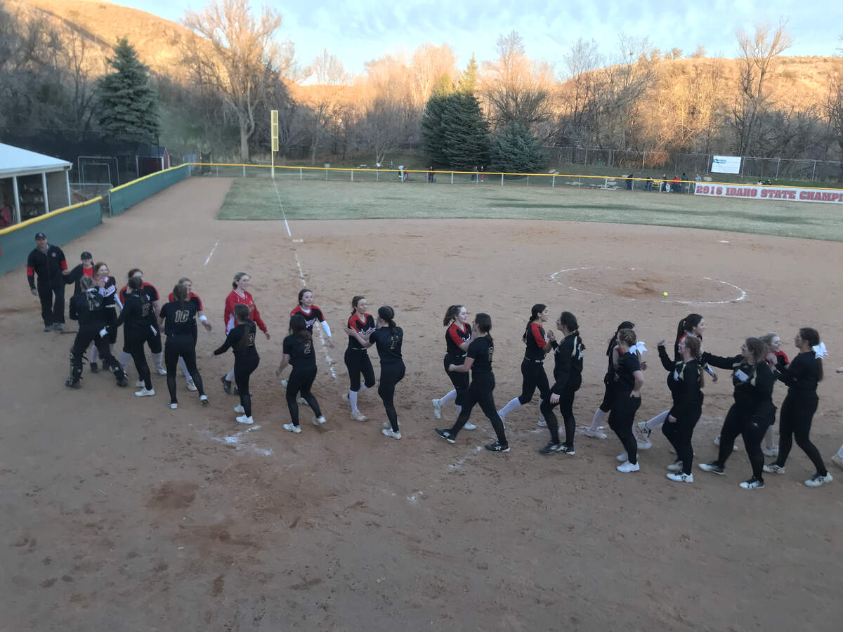 The Boise and Capital high school softball teams played Friday night — with some doubts about how long their seasons will last.