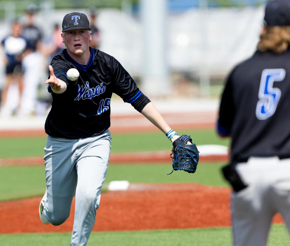 Timberline’s Haiden Delong tosses the ball to first base during last year’s state tournament.