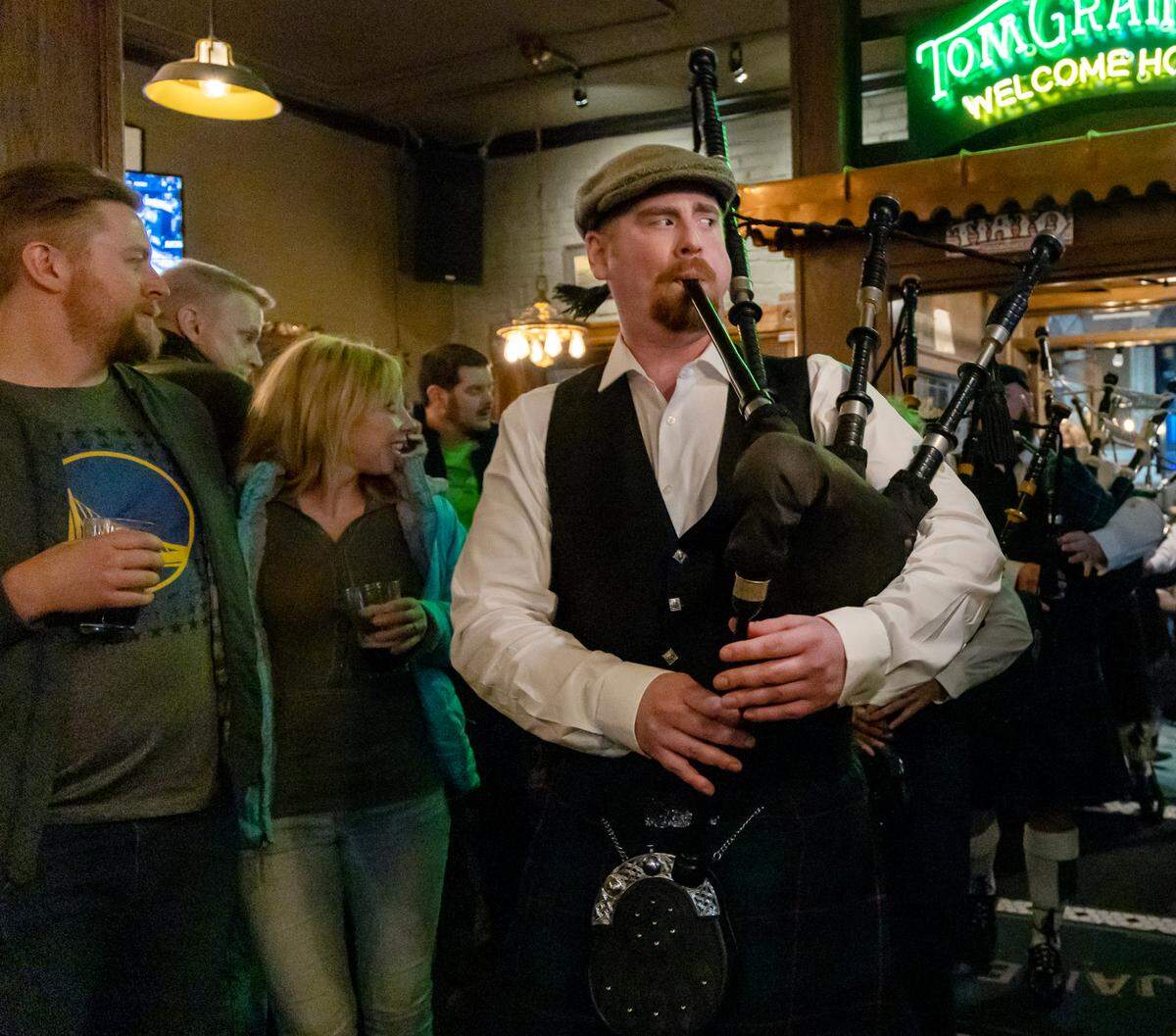 The Boise Highlanders play at Tom Grainey’s, a bar in Downtown Boise, for St. Patrick’s Day, March 17, 2023. The band includes bagpipes, drums and dancers. 