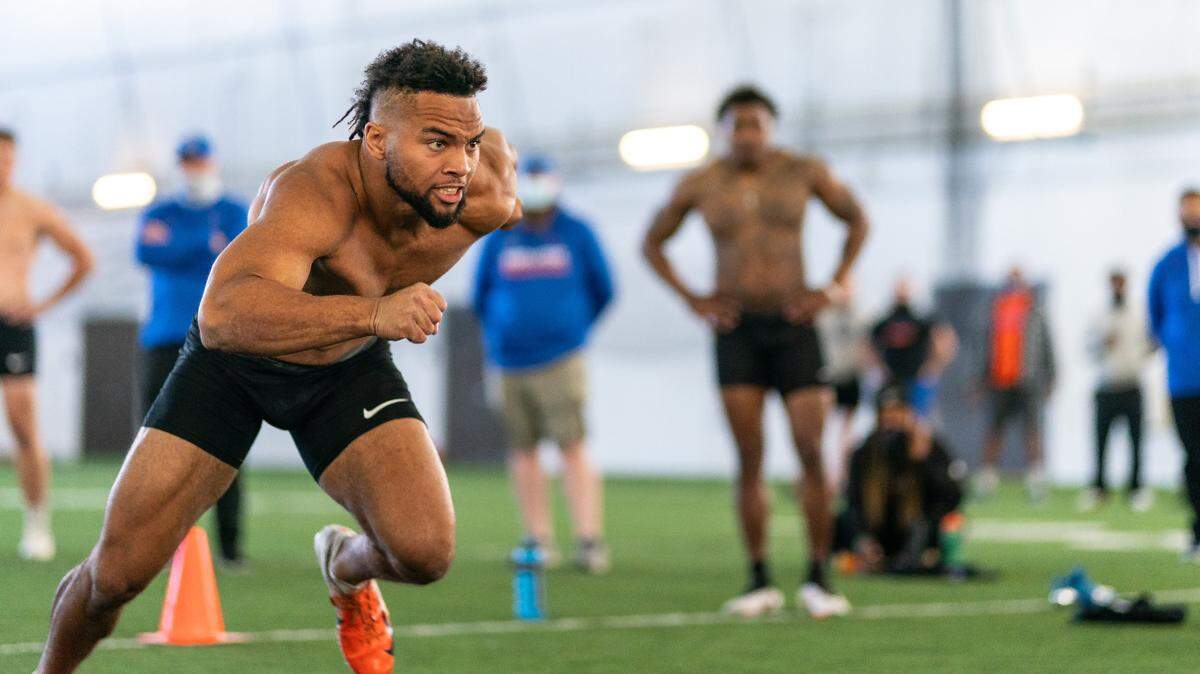 Former Boise State cornerback Avery Williams runs a drill Wednesday during pro day at the Broncos’ indoor facility.