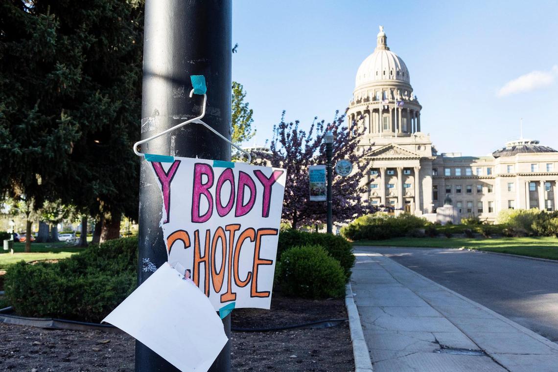 A sign reading “My body my choice” is taped to a hanger taped to a streetlight in front of the Idaho State Capitol Building on Tuesday. People gathered in downtown Boise at both City Hall and the Statehouse to protest the news of the Supreme Court draft leak indicating that Roe vs. Wade and Planned Parenthood v. Casey will be overturned.