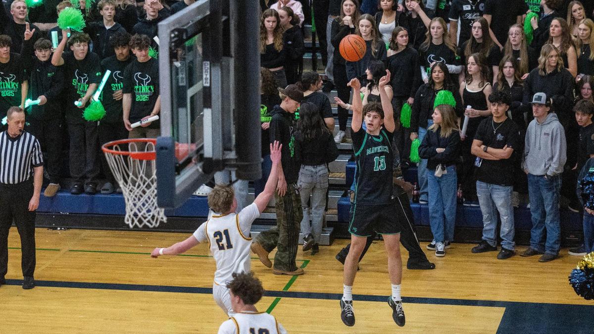 Mountain View senior Zach Smith fires a corner 3-pointer Tuesday in the Stinky Sneaker rivalry game.
