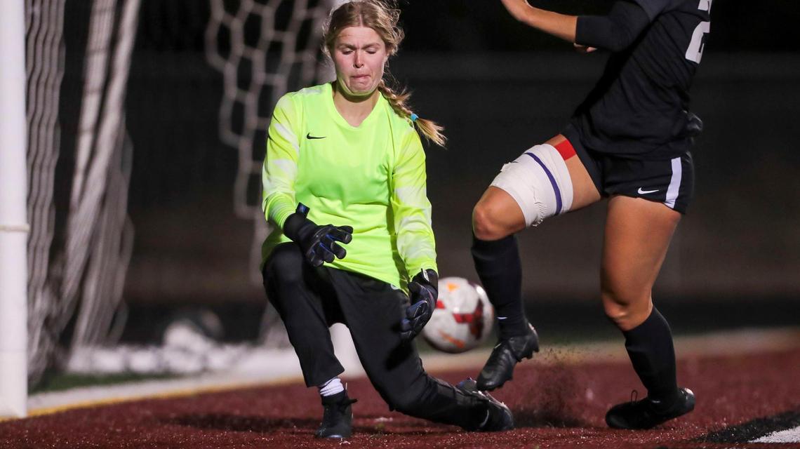 Rocky Mountain forward Nadia Kincaid slips a shot past Timberline goalkeeper Audrey Taylor for what proved to be the game-winning goal in the 5A District Three Tournament championship Wednesday.