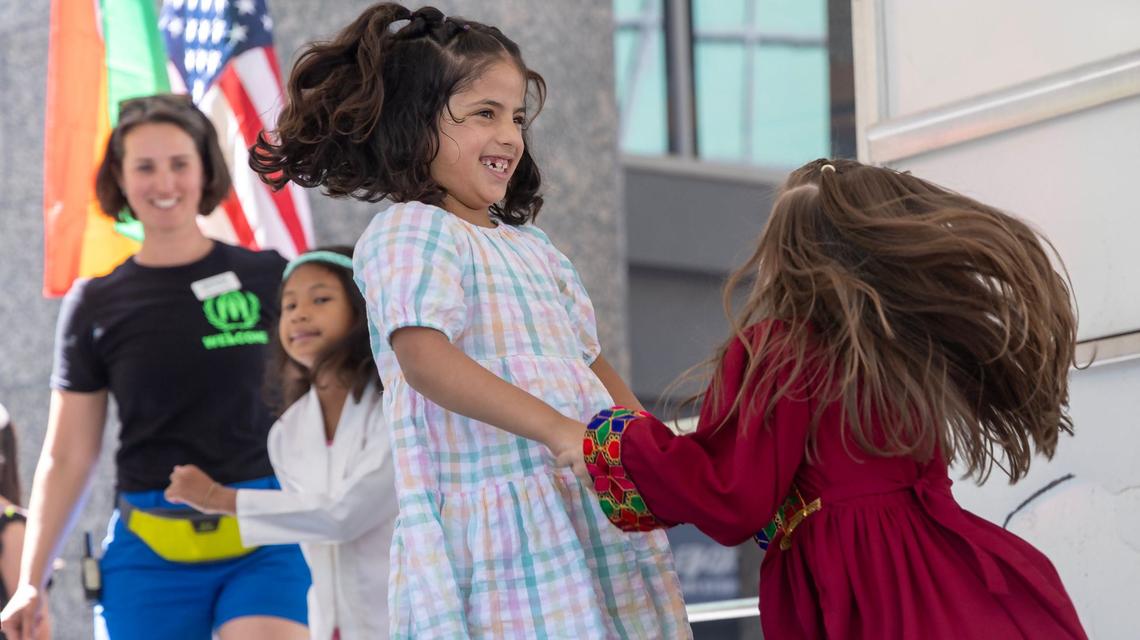 Children danced at World Refugee Day at Grove Plaza in downtown Boise on Saturday. The event is held each year to showcase world cultures and celebrate new citizens.