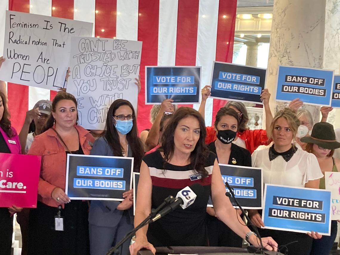 Democratic candidate for lieutenant governor Terri Pickens Manweiler speaks to members of the media and supporters after the U.S. Supreme Court issued an opinion eliminating the federally protected right to an abortion. Manweiler told GOP Idaho lawmakers, who banned abortion pending such a Supreme Court decision, “We won’t go back.”