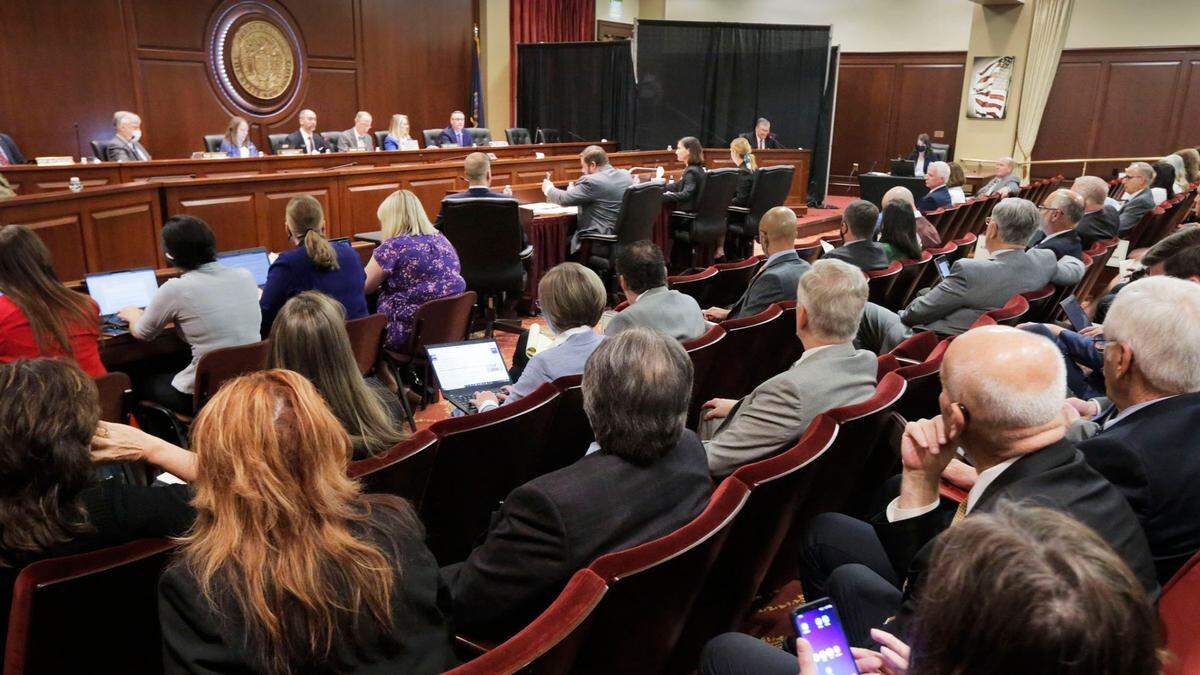 Jane Doe testified from behind a black curtain for the Legislature’s ethics committee.