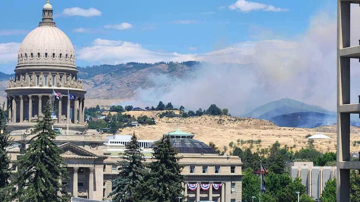 Smoke from the Claremont Fire spreads in the Foothills north of the Capitol in Boise on Monday afternoon.