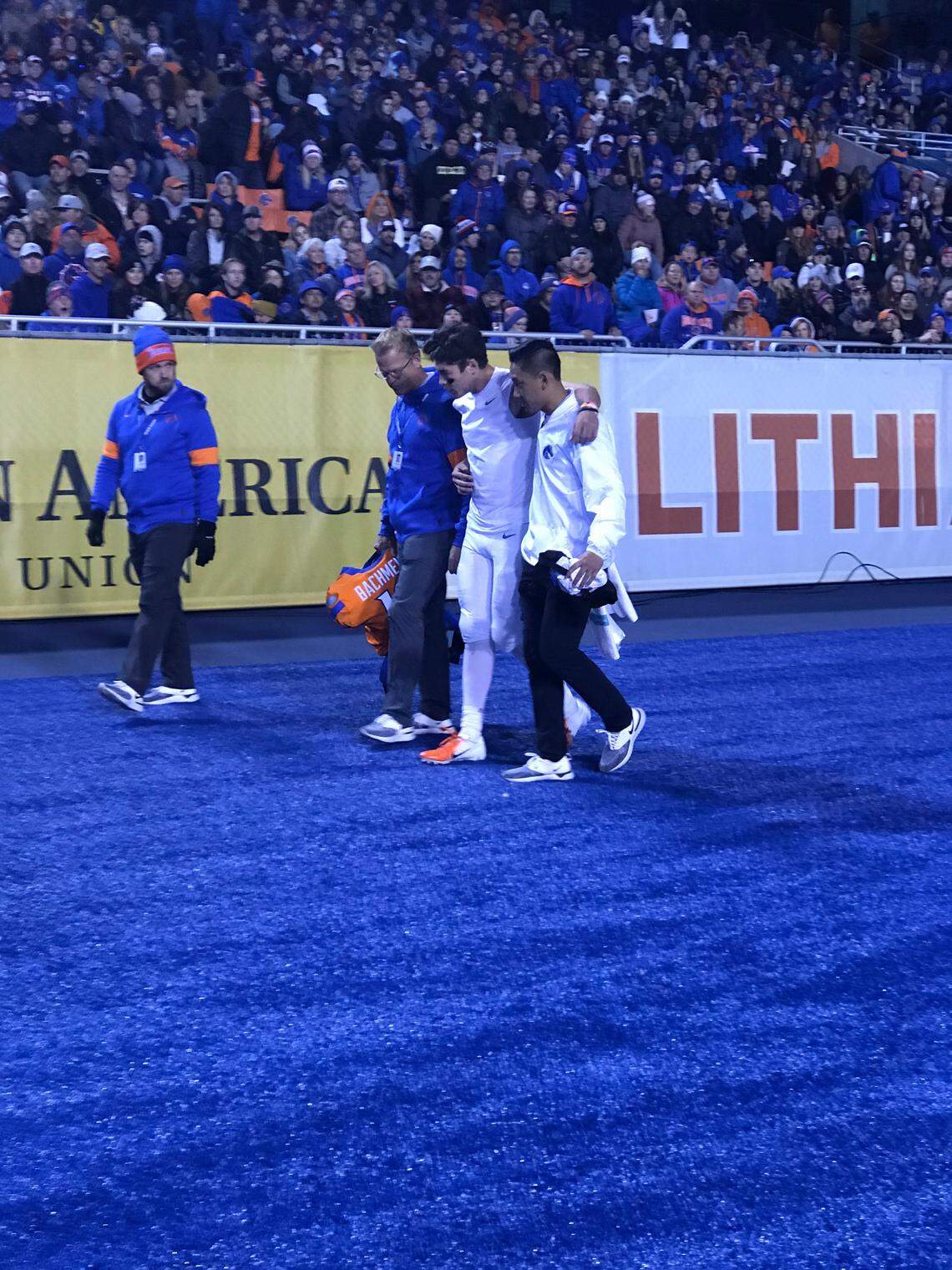 Boise State starting quarterback Hank Bachmeier walks off the field at Albertsons Stadium after taking a big hit in Saturday’s game against Hawaii.