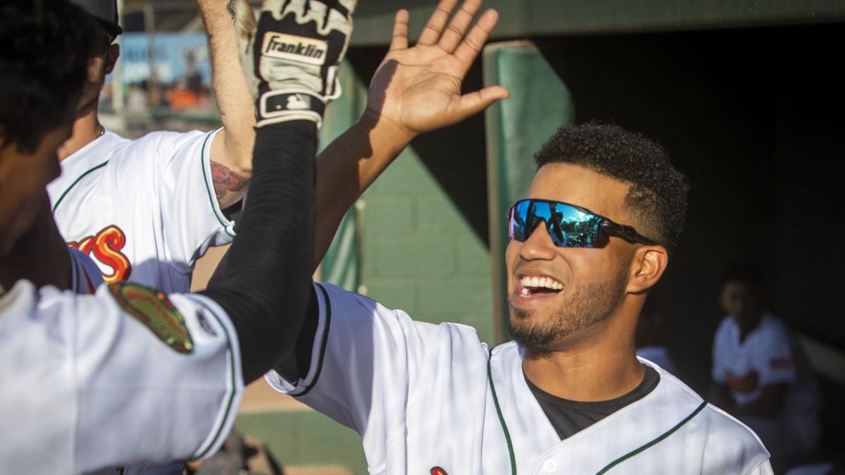 The Boise Hawks lost their Major League affiliation Wednesday as MLB dramatically restructed its minor leagues. Above, Yorvis Torrealba congratulates teammate Ezequiel Tovar after scoring a run in 2019.