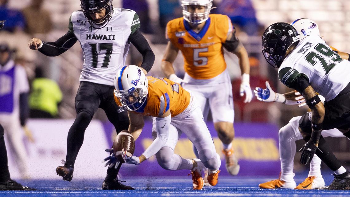Boise State’s Kekaula Kaniho (28) fields a Hawaii onside kick in the fourth quarter Saturday at Albertsons Stadium.