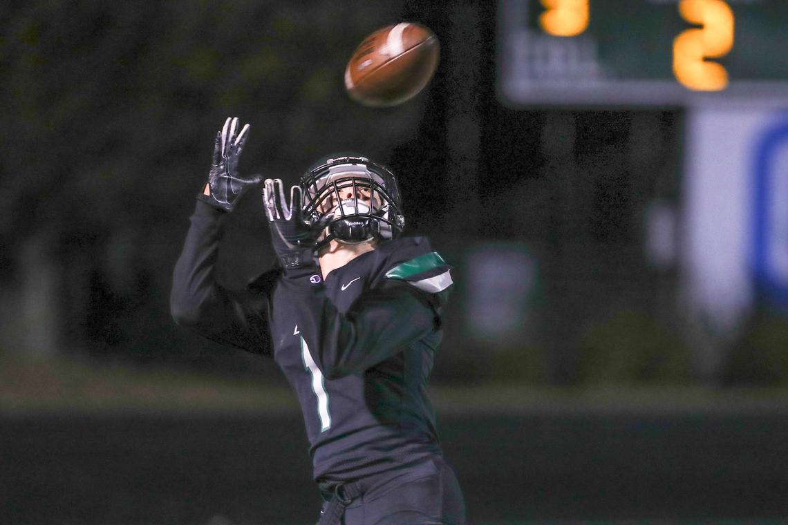 Eagle wide receiver Dalton Mashore catches a touchdown pass from quarterback Mason McHugh during 5A state playoff action between Capital and Eagle on Friday night at Eagle High. The Mustangs won 52-32.
