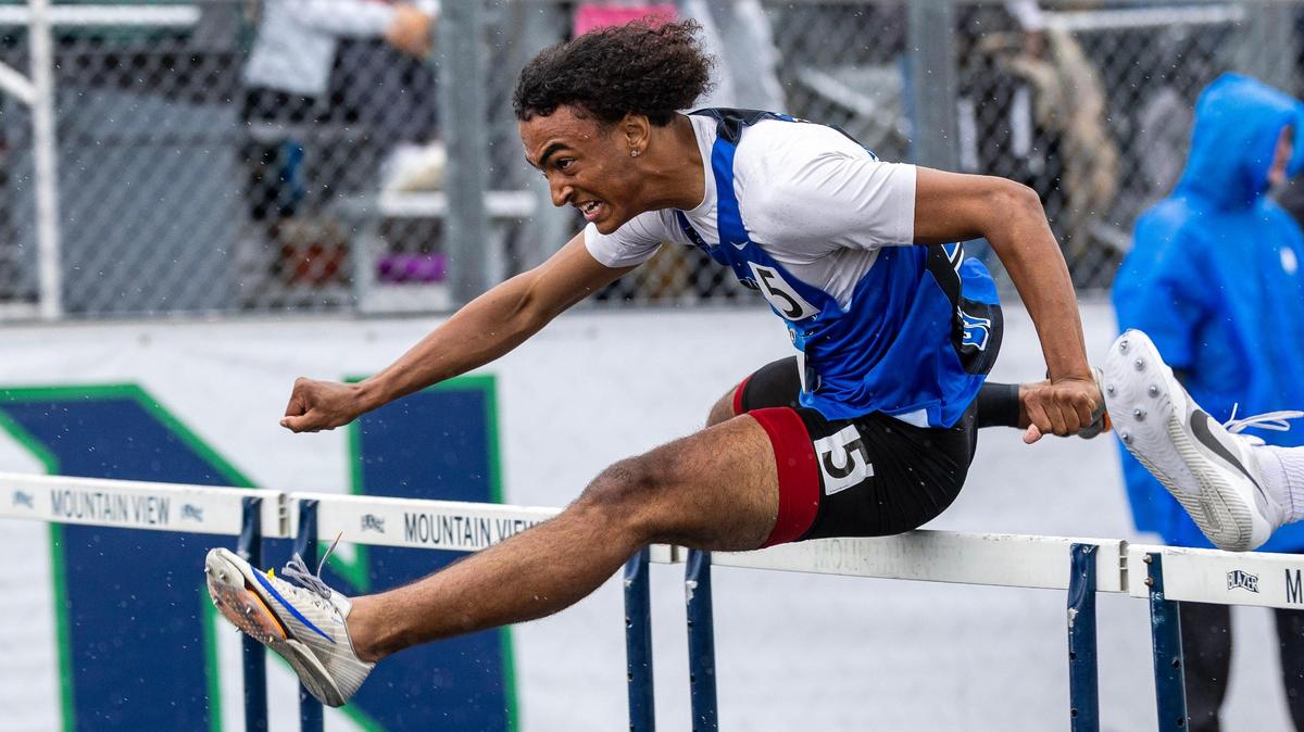Kenyon Carter of Emmett takes first in the 5A boys 110 meters hurdles on the second day of the Idaho state track and field championships held at Mountain View High School, Saturday, May 17, 2025.