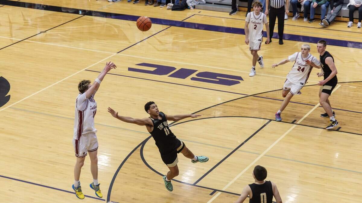Columbia junior Max Keller throws the game-winning shot in the final seconds of overtime in their 5A boys basketball state tournament game against Vallivue held at Rocky Mountain High School, Thursday, March 5, 2026. Columbia won 69-68.