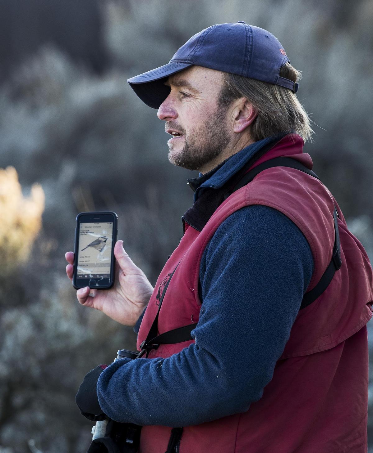 Jay Carlisle, reseach director at Boise State’s Intermountain Bird Observatory, joins volunteers for the annual Christmas Bird Count in the Treasure Valley. He uses a popular birding app on his smart phone to voice bird calls to help reveal species and numbers. He pointed out that this is the only time of year he uses the recordings, when birds are not territorial and won’t be agitated by rivals.