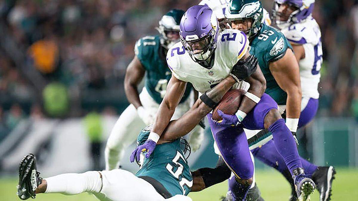 Philadelphia Eagles linebacker Zach Cunningham (52) tackles Minnesota’s Alexander Mattison in the third quarter Thursday in Philadelphia.