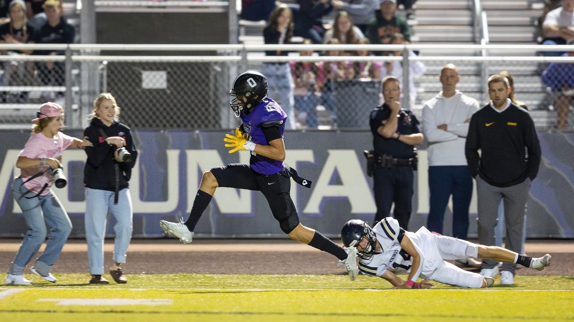 Rocky Mountain senior wide receiver Kade Benedick breaks away from Middleton defensive back Derrick Walker for a touchdown in the second quarter.