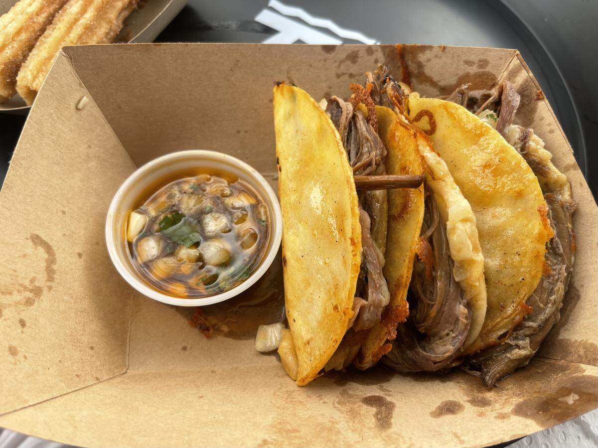 Birria tacos from Tin Roof for $9.