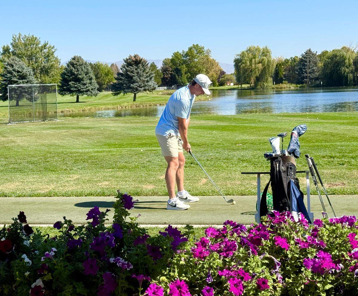 A golfer tees up at Lakeview’s turf driving range.