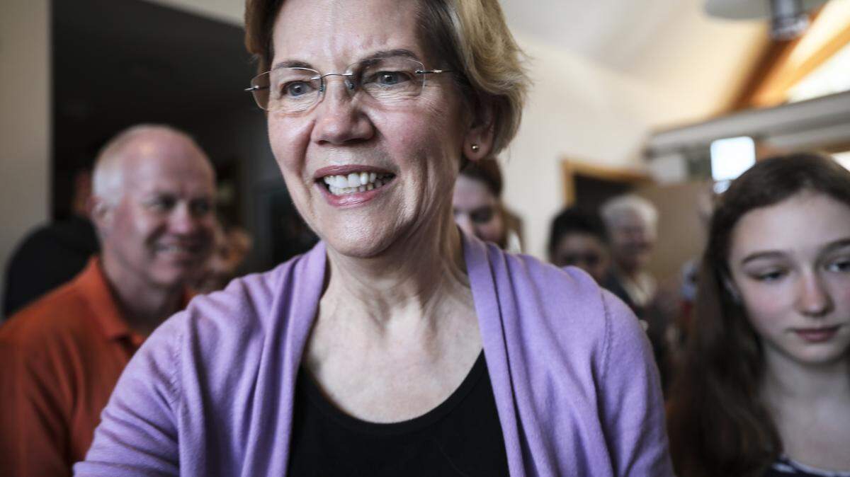 Sen. Elizabeth Warren D-Mass., arrives at a home in Lebanon, N.H., on April 13 as she campaigns for the presidency.