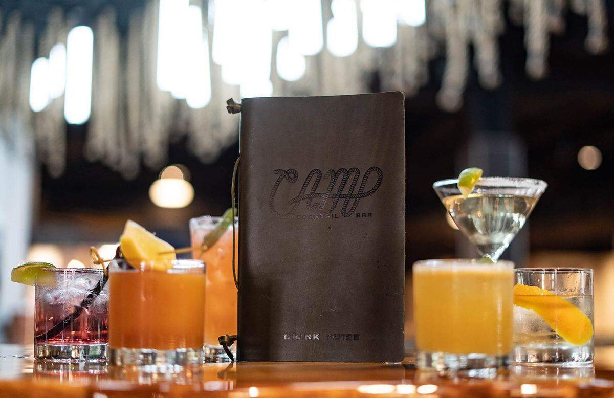 Get your drink on at Camp Cocktail Bar at The Warehouse Food Hall.