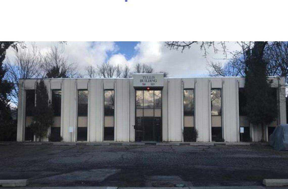 The Tullis Building at 516 W. Franklin St., built in 1972, would be torn down and replaced with a single-family residence, under a request by Jim and Gayle Chalfant.