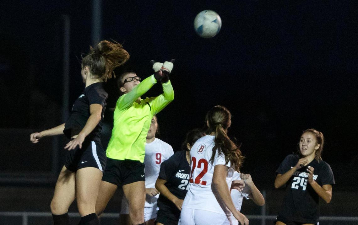 Boise goalkeeper Sophie Hills punches a Rocky Mountain corner kick out of play Monday.