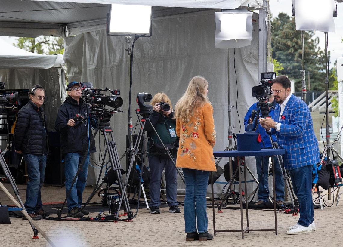 A guest is filmed for the Antiques Roadshow television show with watch appraiser Peter Planes, at right, at the Idaho Botanical Garden in Boise on Tuesday. The TV show will produce three episodes from the Boise event, and those episodes will run on PBS in 2023 for the show’s 27th season.