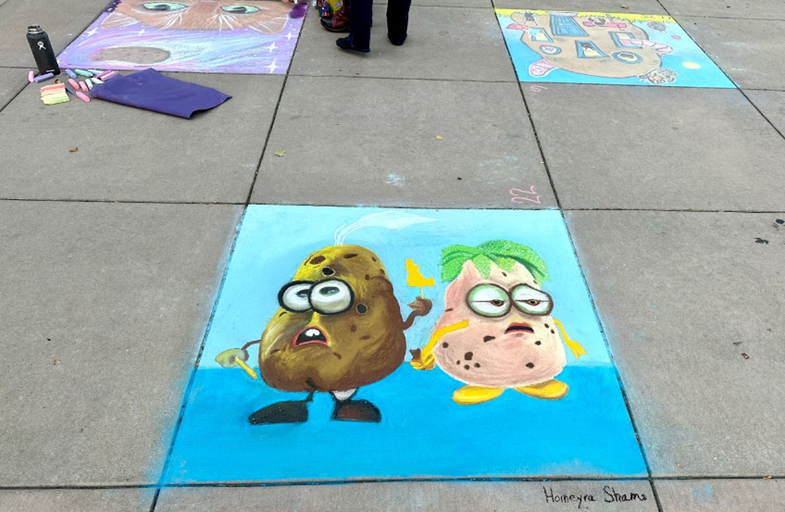Watch your step! That’s potato-themed chalk art.