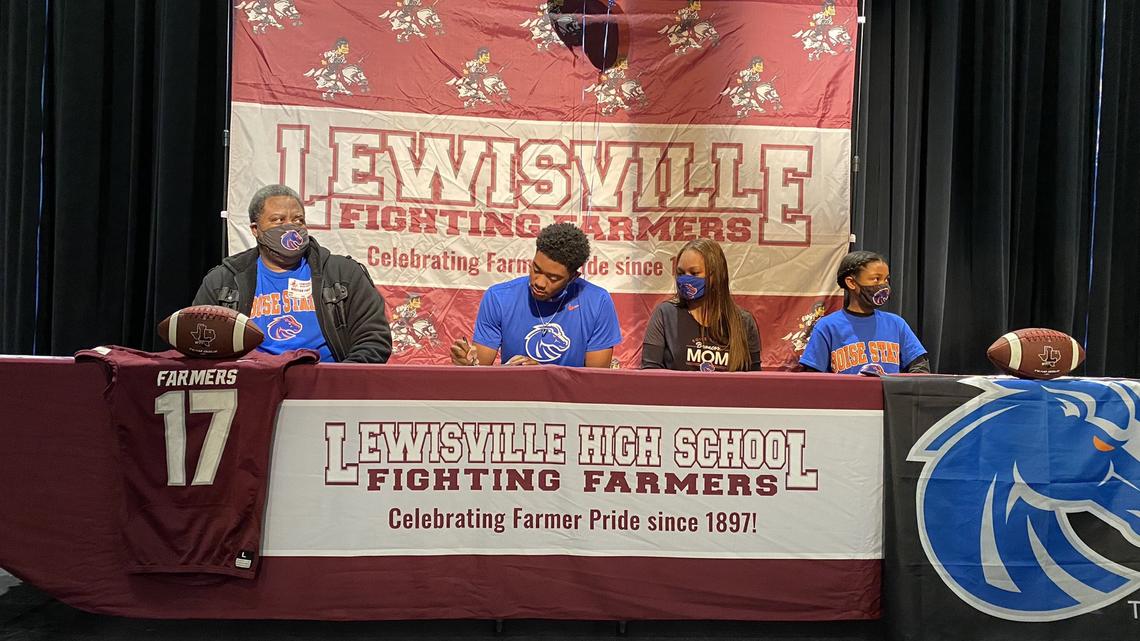Quarterback Taylen Green signs with Boise State on Wednesday during an early signing day ceremony at Lewisville High in Texas.
