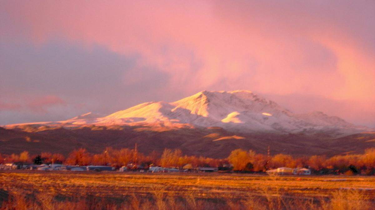 Squaw Butte after some storms in 2009.  The photo was taken from Quail Run Lane in Emmett.