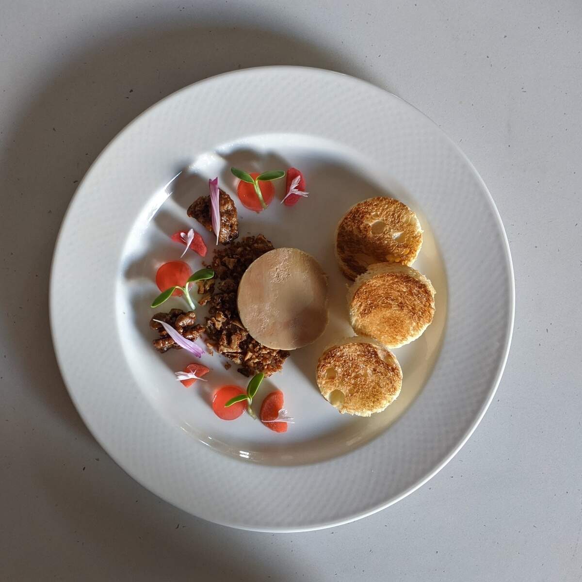 This foie gras torchon with rhubarb, sunflower and walnuts will work its way onto the menu when the season rolls around again for the rhubarb, chef Edward Higgins said.