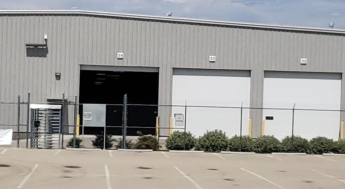 The warehouse obtained by Amazon has 18 docks for use by semi trucks to unload packages.